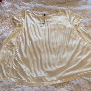 Cream colored sheer back Express top.